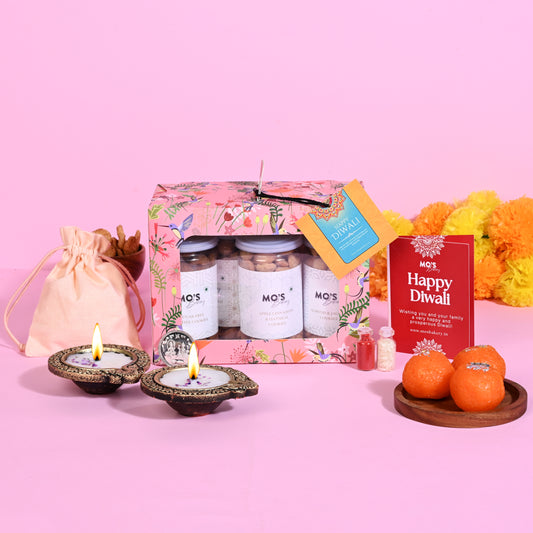 Premium Diwali Gift – Pink Cookie Box (Set of 4 Flavours) with Diyas, Roli Tikka Pouch & Greeting Card