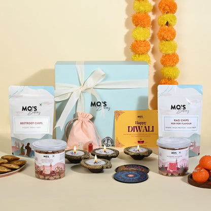 Mo’s Blue Gift Box Raspberry & apple cinnemon  Cookies – 2 Cookies, 4 Diyas, 2 Coasters, Roli Tikka Chawal Set & Potli Pouches