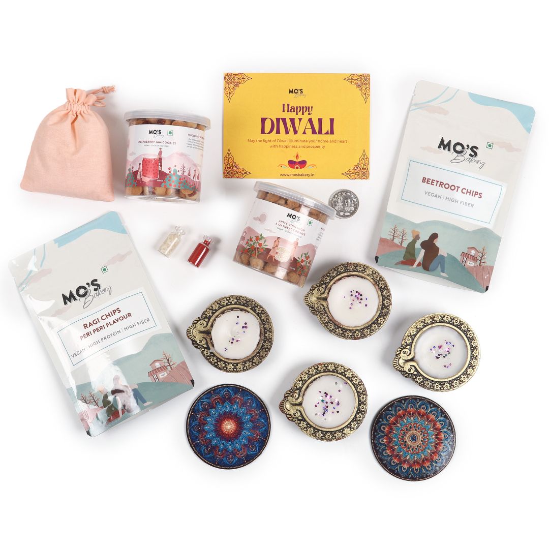 Mo’s Blue Gift Box Raspberry & apple cinnemon  Cookies – 2 Cookies, 4 Diyas, 2 Coasters, Roli Tikka Chawal Set & Potli Pouches