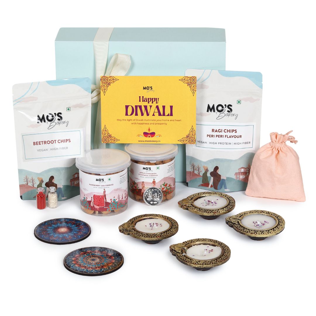 Mo’s Blue Gift Box Raspberry & apple cinnemon  Cookies – 2 Cookies, 4 Diyas, 2 Coasters, Roli Tikka Chawal Set & Potli Pouches