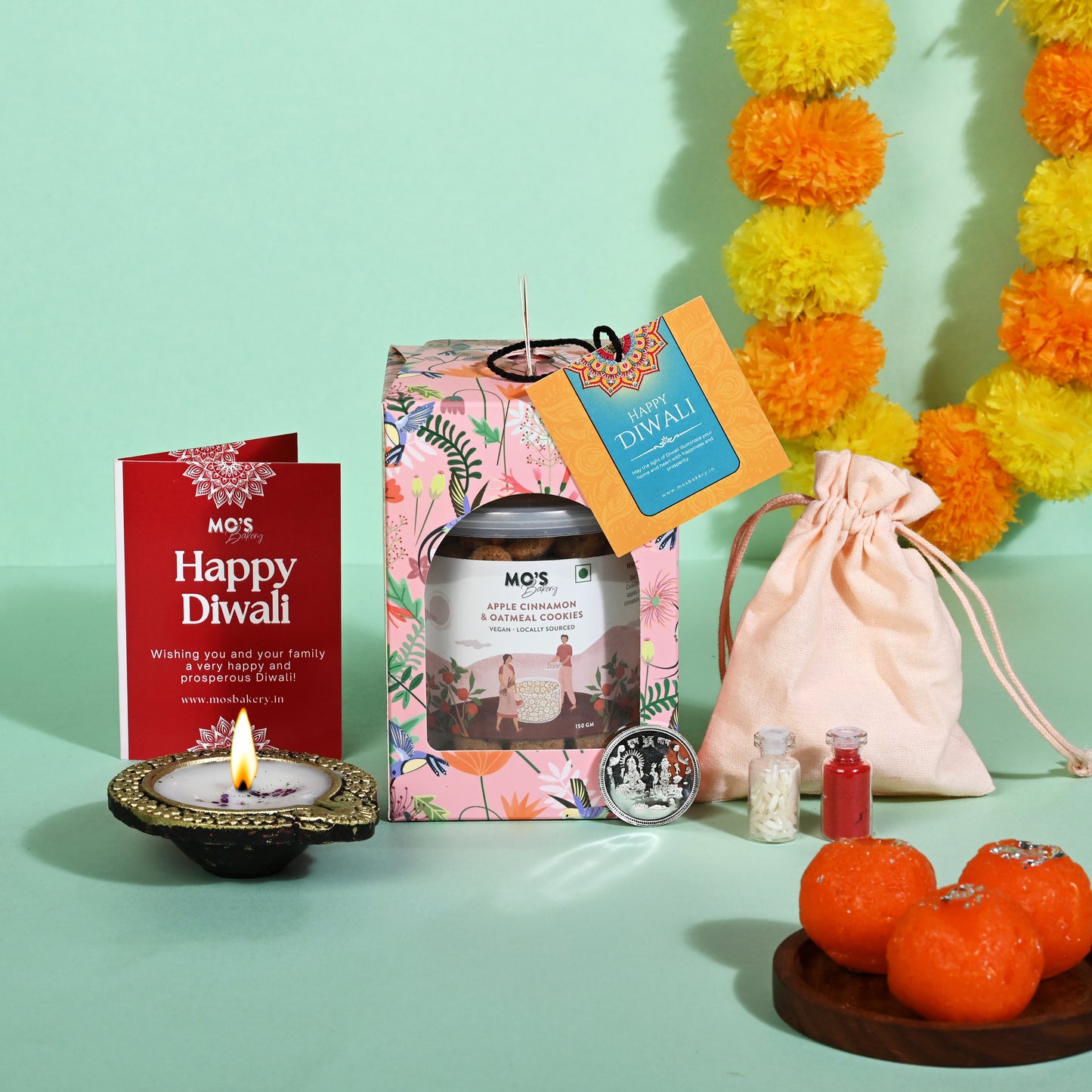 Premium Diwali Apple Cinnamon Cookies Pink Gift Box with Diya, Pooja Coin and Roli